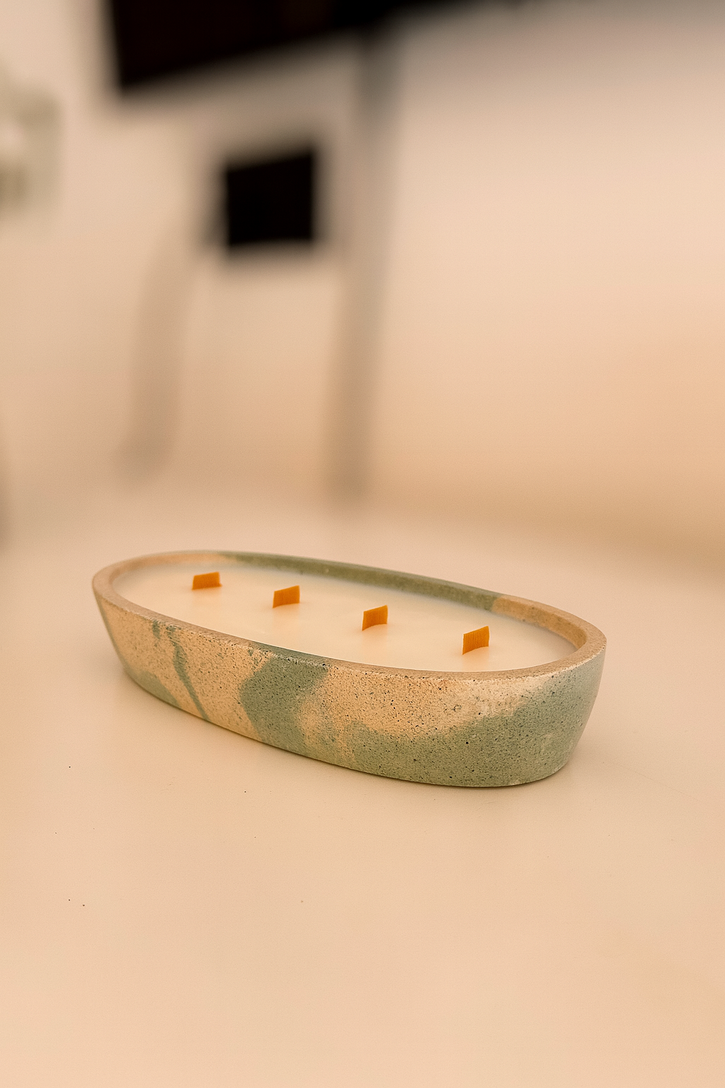 Vela oval de concreto aromática